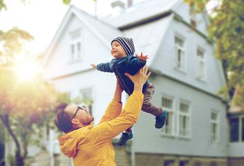 father with son playing and having fun outdoors