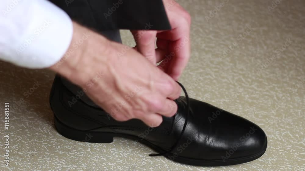 Tying laces on shoes Tying laces on shoes