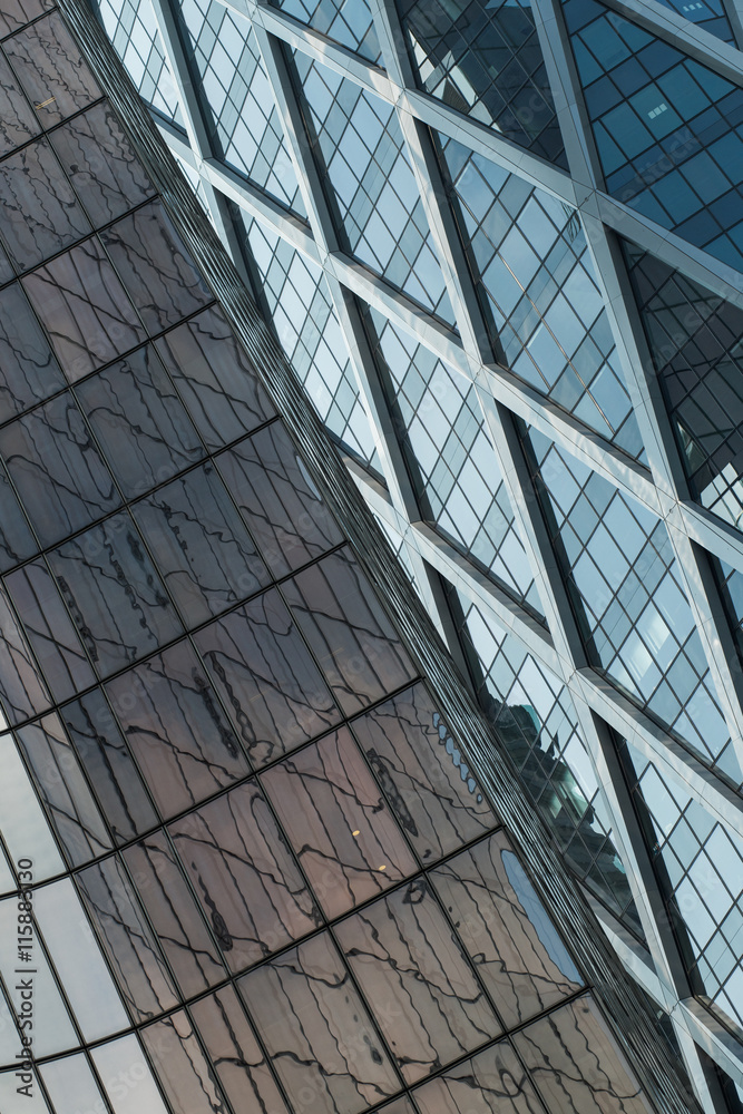 Obraz premium Skyscrapers with glass facade. Modern buildings in Paris business district. Concepts of economics, financial, future. Copy space for text. Dynamic composition.