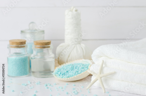 White towel with aromatherapy spa tools