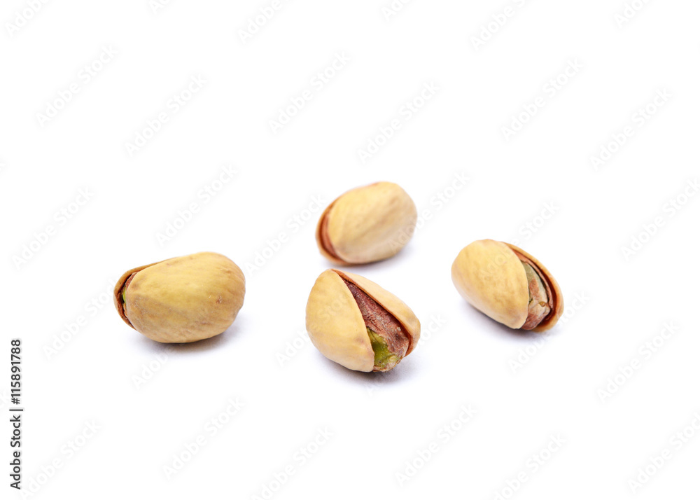 Pile of fruit pistachios isolated on white background Pile of fruit pistachios isolated on white background