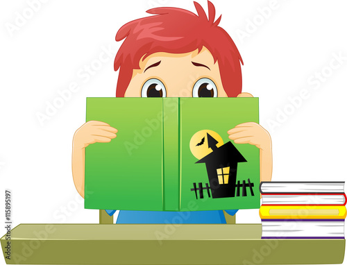 scared little boy reading a horror comic strip