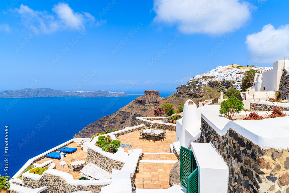 View of beautiful Firostefani village with typical white architecture, Santorini island, Greece
