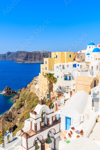 View of colorful houses in Oia village on Santorini island, Greece