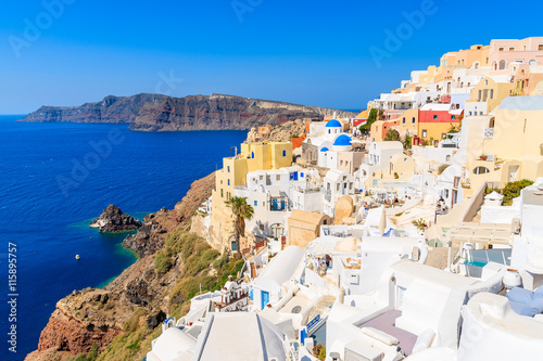 View of famous Oia village with colorful houses, Santorini island, Greece