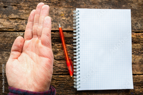 man show the problem lefties - the marks of the spring notebook on the arm photo