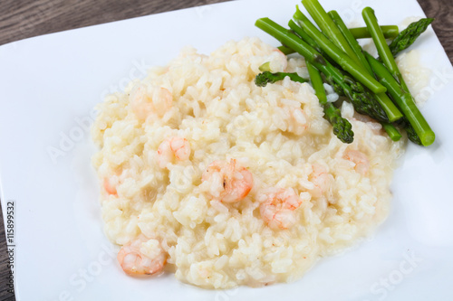 Risotto with shrimps and astaragus photo