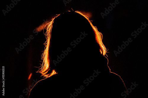 red hair girl backlit bright lantern