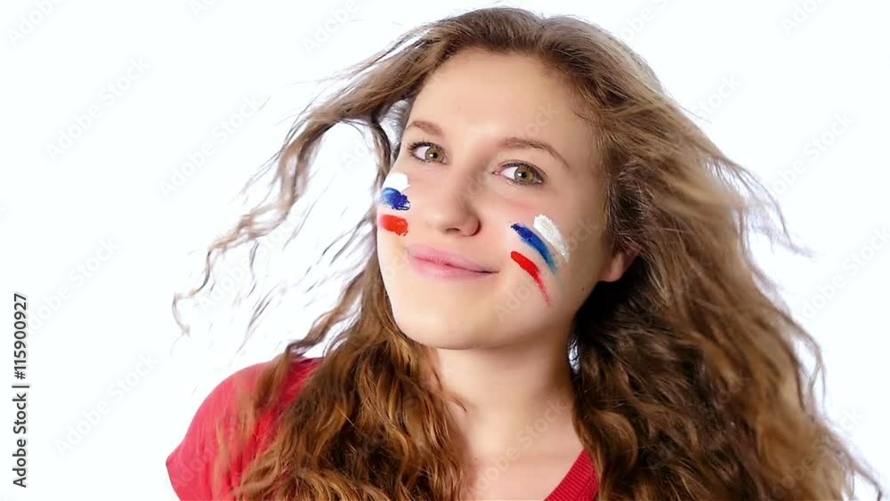 Girl with Russian flag on her face smiling, slow motion Girl with Russian flag on her face smiling, slow motion