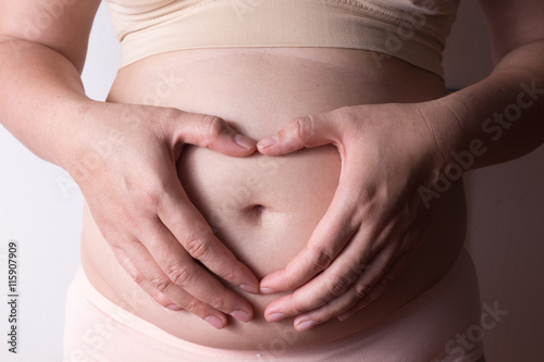 Wallpaper Mural belly of pregnant woman Torontodigital.ca