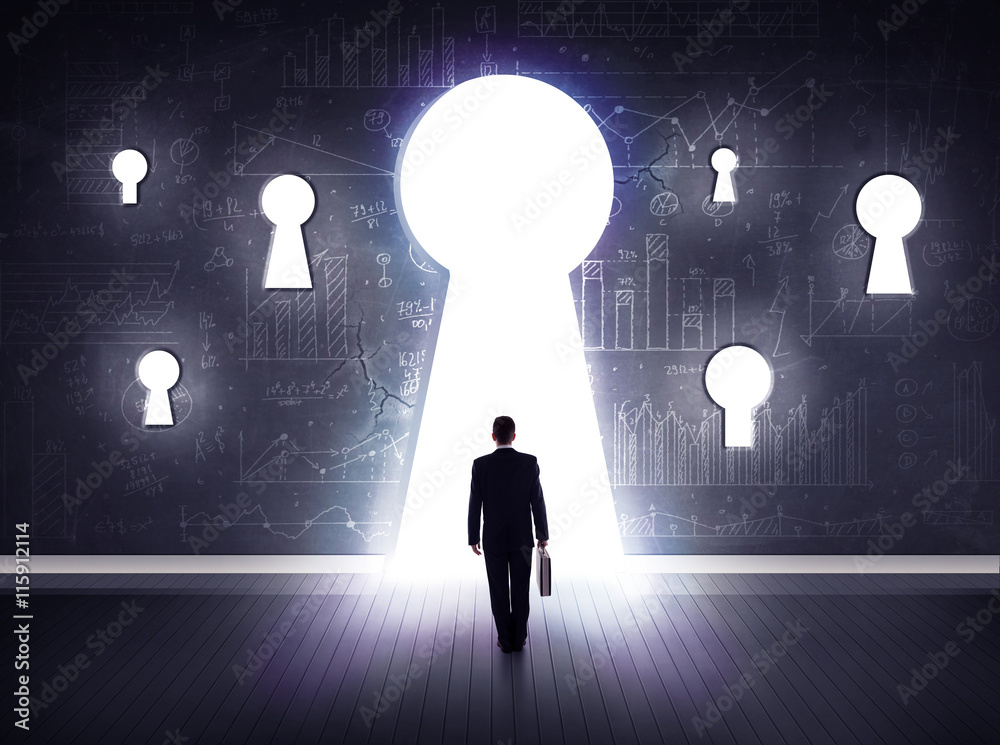 Obraz premium businessman looking through keyhole