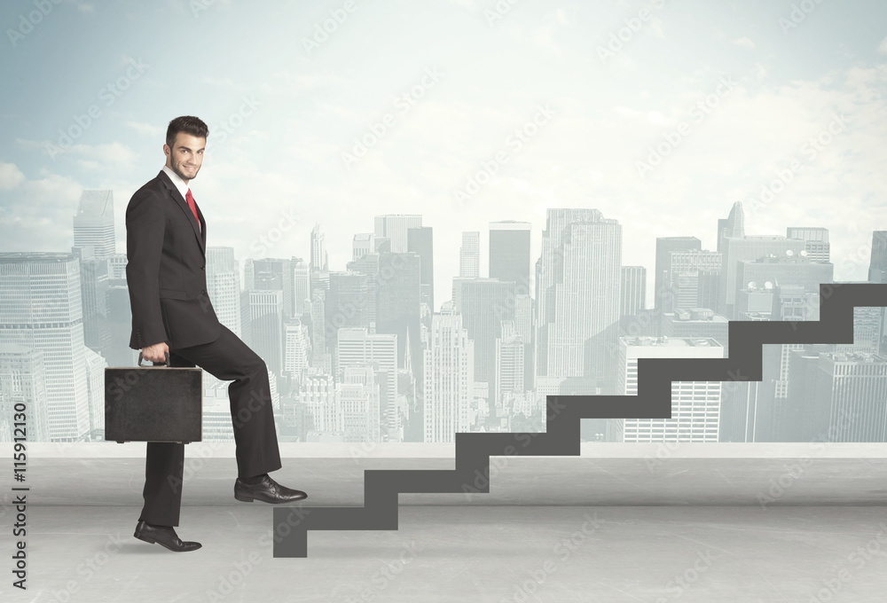 Business person in front of a staircase Business person in front of a staircase
