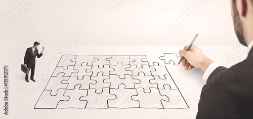 Business man looking at hand drawing solution