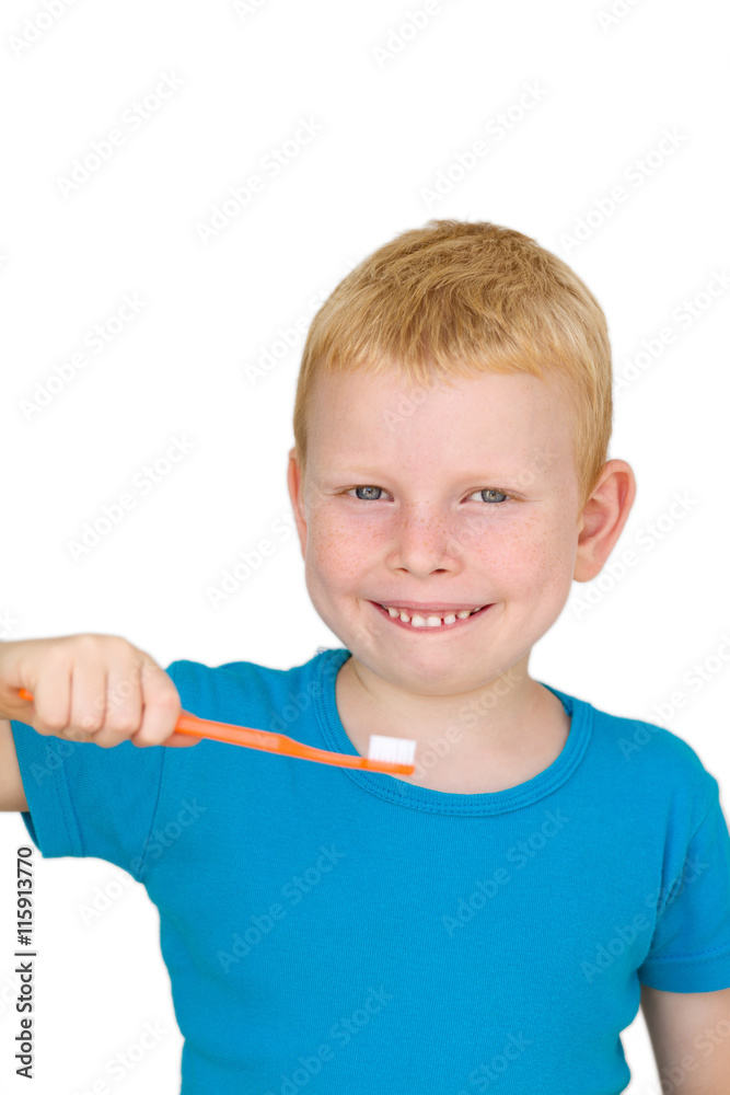 Boy brushing Teeth in front of White Background with Copy Space Boy brushing Teeth in front of White Background with Copy Space