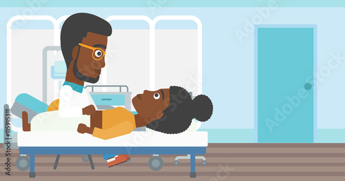 Doctor touching abdomen of female patient.