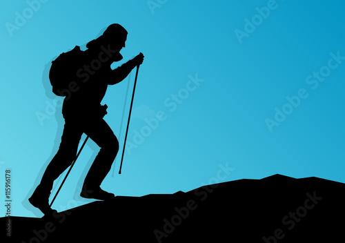 Man hiking in mountains adventure nordic walking with poles in n