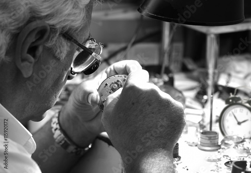Antique clock repair man