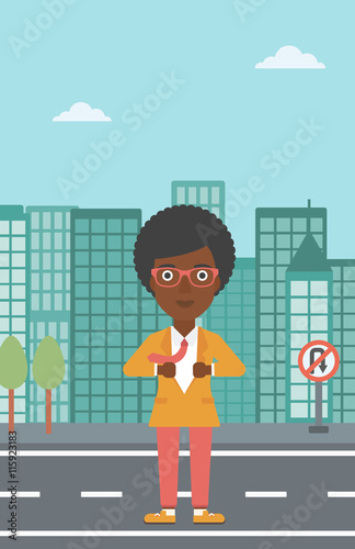 Business woman opening her jacket like superhero.