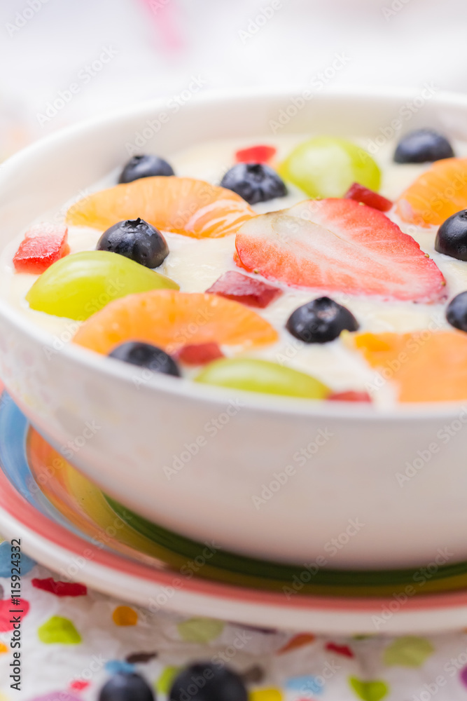 Delicious milky vanilla pudding colorful fruit