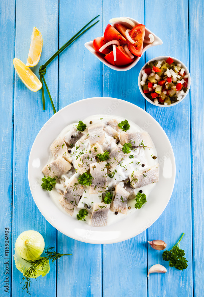 Marinated herring fillets in cream 