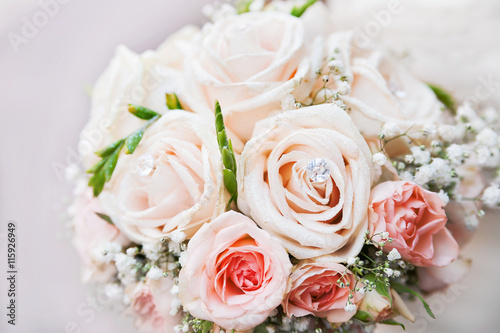 Wedding bouquet. Bride s traditional symbolic accessory. Floral composition with pink rose flowers.