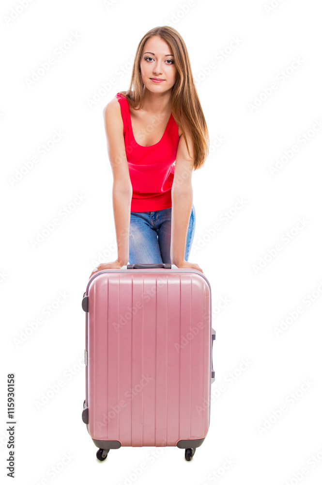 Young attractive woman in blue jeans with a suitcase isolated on white background. Young attractive woman in blue jeans with a suitcase isolated on white background.