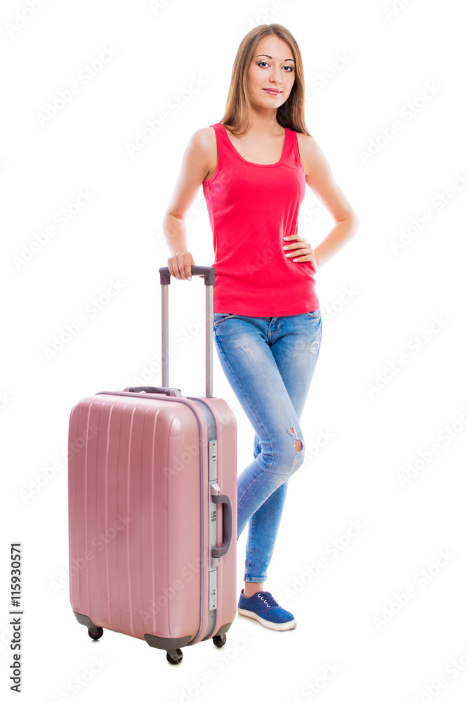 Young attractive woman in blue jeans with a suitcase isolated on white background. Young attractive woman in blue jeans with a suitcase isolated on white background.