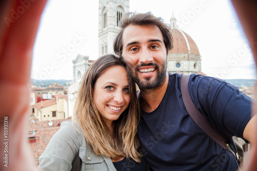 Slika na platnu Loving couple having selfie in front of the church Santa Maria del Fiore, Floren