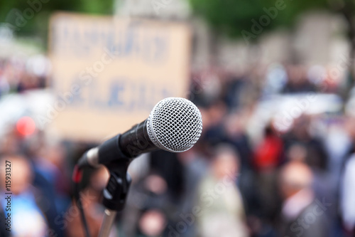 Protest. Public demonstration. Microphone.