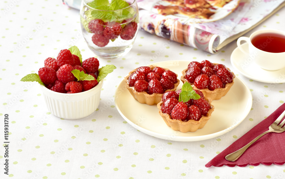 Fruit raspberry cakes on a table Fruit raspberry cakes on a table