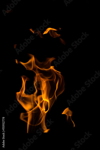 Fire flames on black background © hideto111