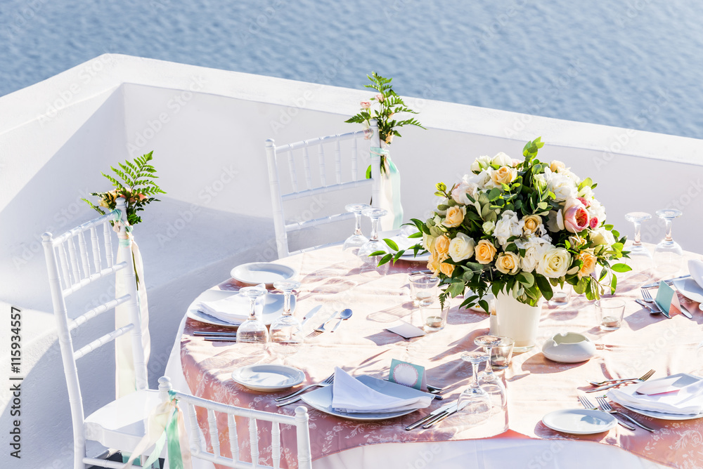 Beautiful interior table setting for wedding, Santorini, Greece - obrazy, fototapety, plakaty 