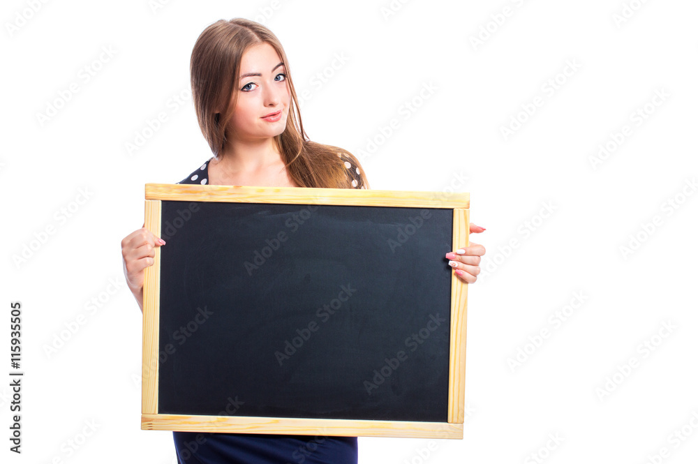 Young girl with a beautiful smile holding a blackboard for drawing with chalk, isolated on white background. Young girl with a beautiful smile holding a blackboard for drawing with chalk, isolated on white background.