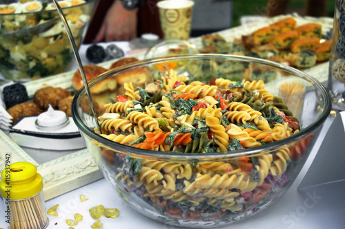 Dish with pasta in a transparent bowl photo