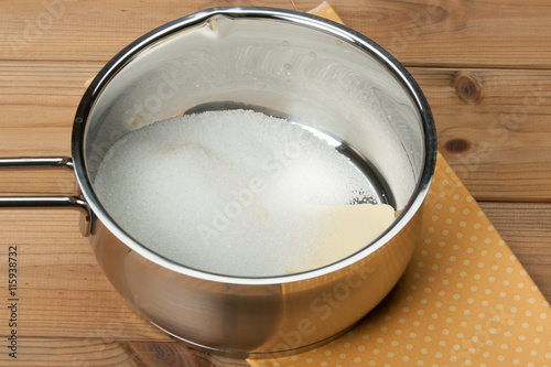 Butter And Sugar In Sauce Pan. Cooking Process. Bakery Preparati