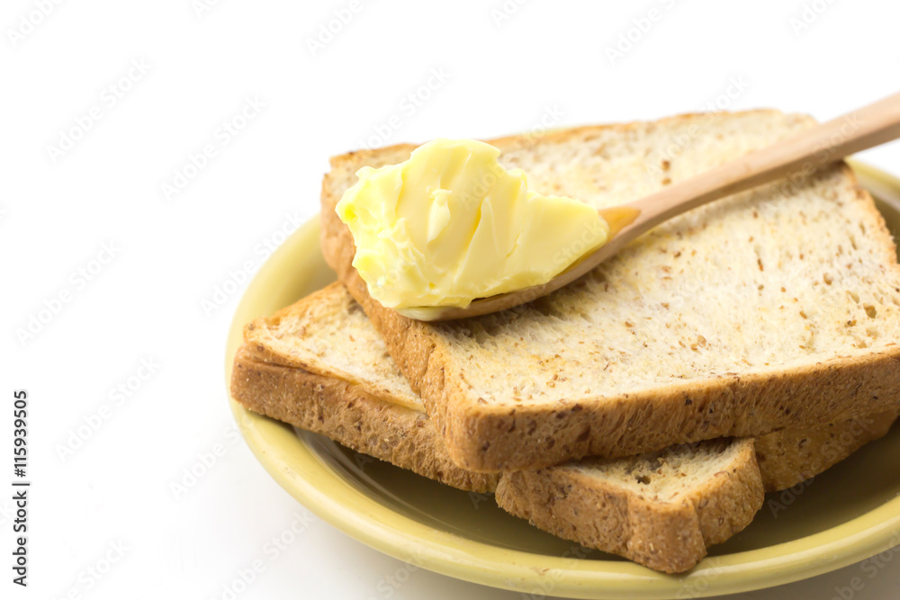 Butter and breads on white background 