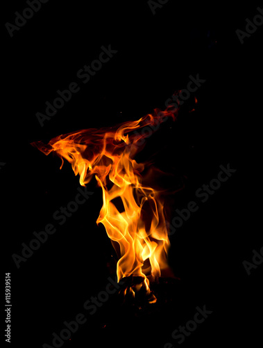 Fire flames on black background © hideto111