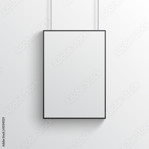 White poster with black frame mockup on grey wall