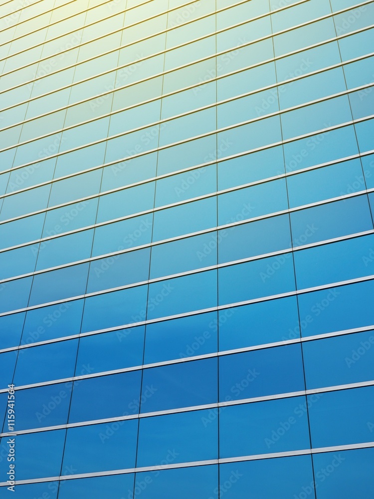 Blue glass wall of modern building Blue glass wall of modern building