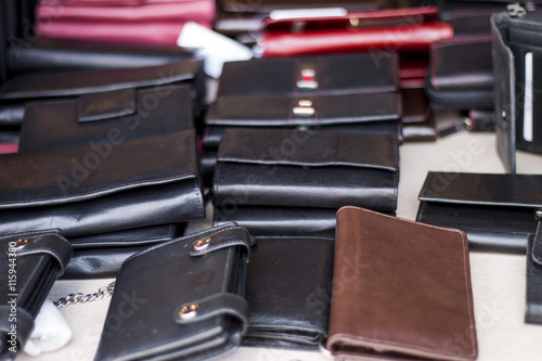 Diffrent kind of leather wallets on market table