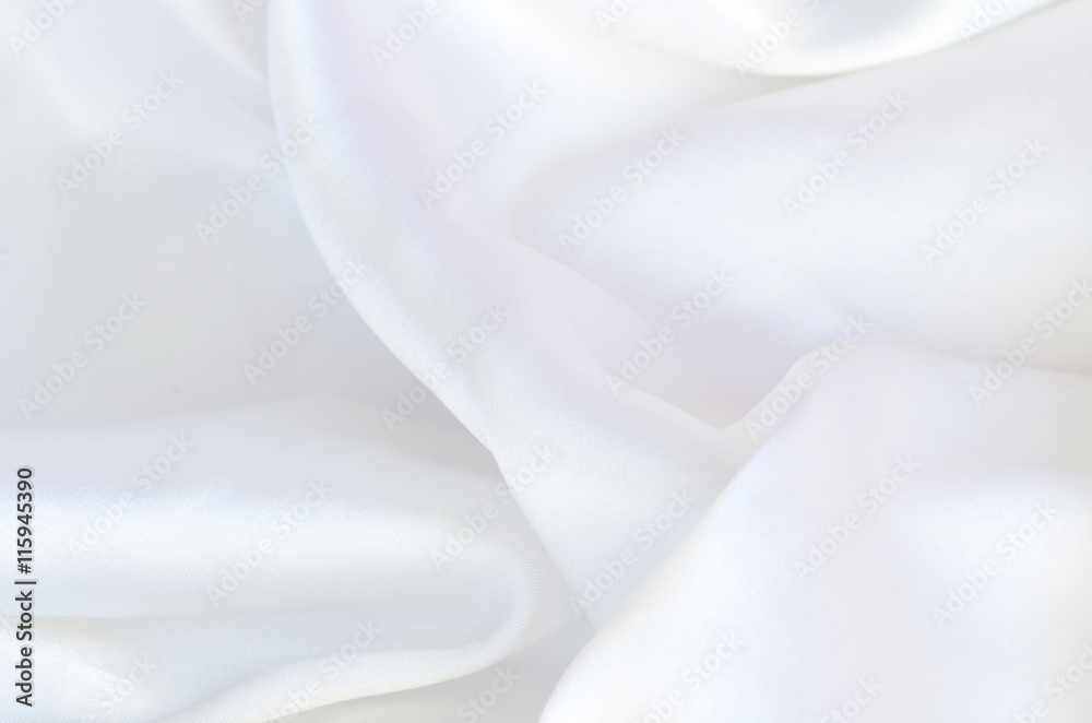Smooth elegant white silk, satin fabric background texture