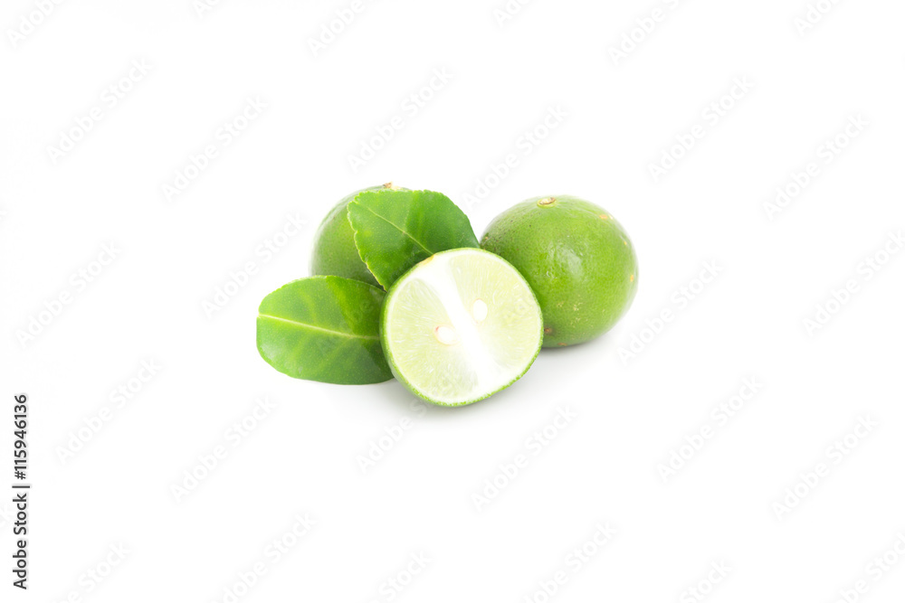 Lime with half and leaves isolated on white background Lime with half and leaves isolated on white background
