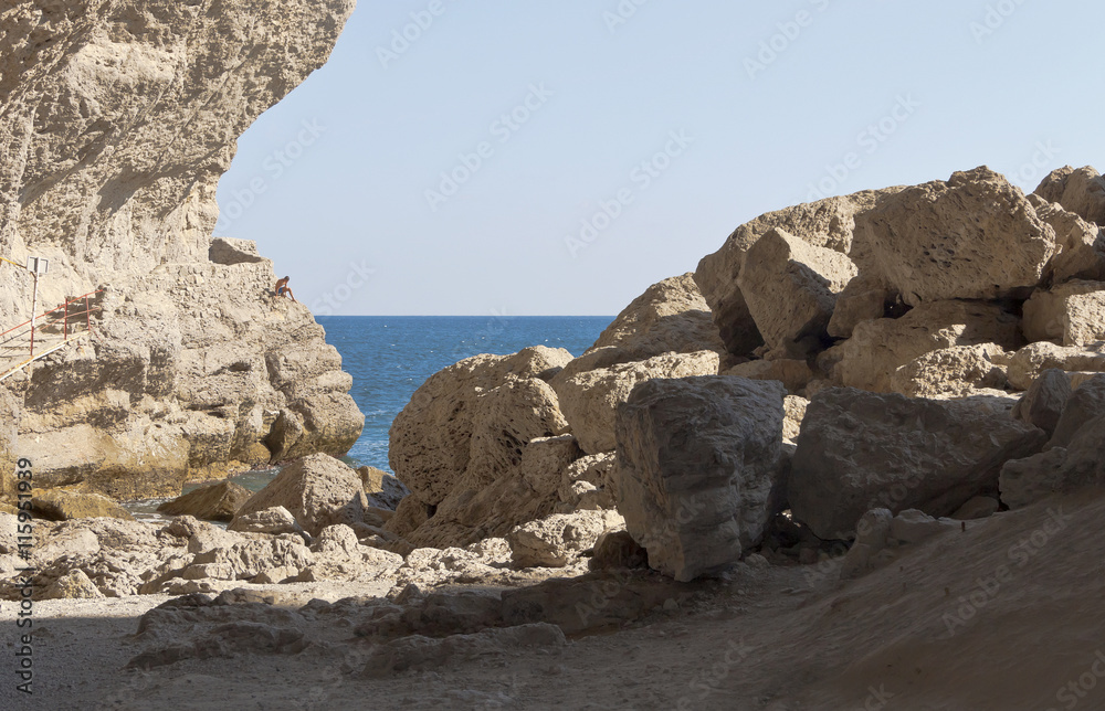 A chaos of huge rocks at the entrance to the grotto Chaliapin.New Light.Crimea.
