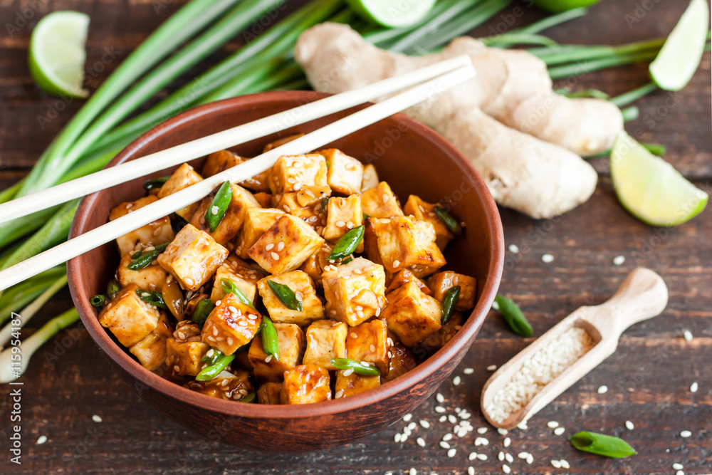 Fried tofu with sesame seeds and spices - obrazy, fototapety, plakaty 