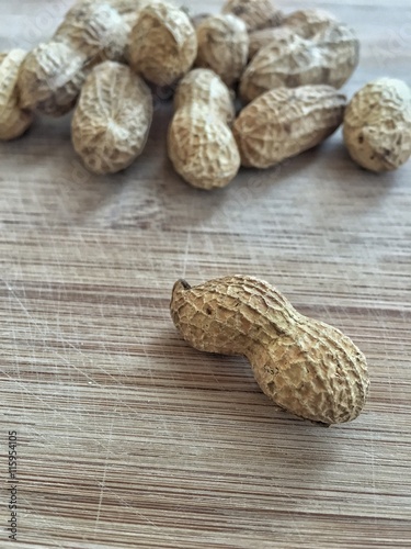 peanuts on wooden table