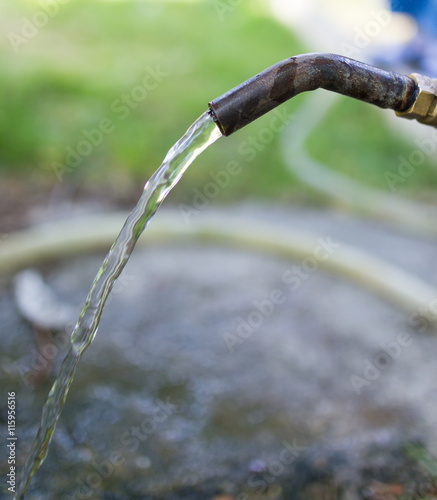 tap water in a park on the nature © schankz