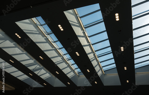  The glass roof of a building against sky