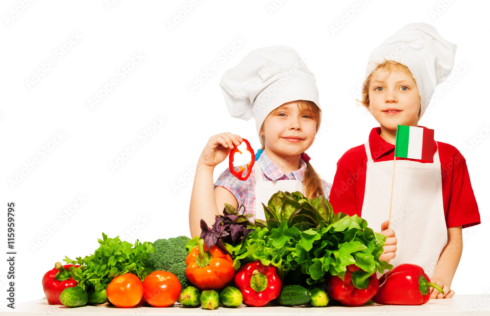 Young Italian cooks preparing fresh salad Young Italian cooks preparing fresh salad