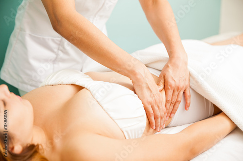 Konstfotografi Deep tissue and reductive massage on a woman at a spa