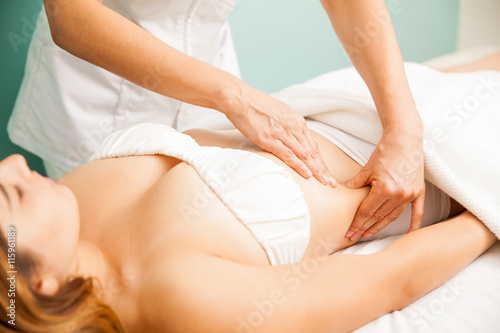 Woman getting a lymphatic massage photo